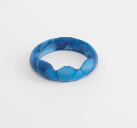 Dinosaur Designs Paradise resin bangle in sky blue marbled resin