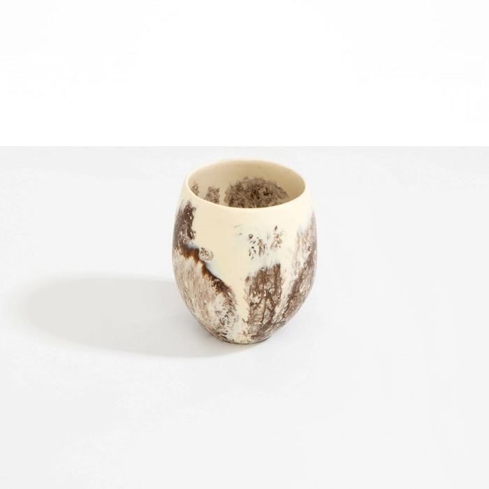 Dinosaur Designs Rock cup in cappuccino, cream resin with brown marbling