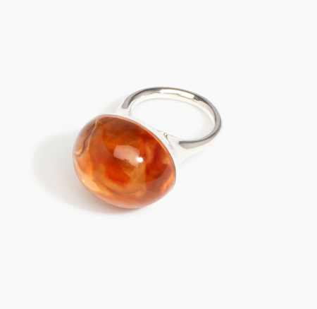 Dinosaur Designs Round watercolour ring in clear strawberry resin, side view