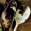 Dinosaur Designs long Stone resin salad servers in cappuccino, cream with chocolate marbling, styled on timber with berries