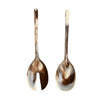 Dinosaur Designs long Stone resin salad servers in dark horn, chestnut-brown with caramel swirls