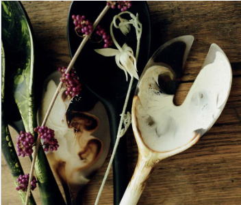 Dinosaur Designs short Stone salad servers in resin, styled on timber with berries