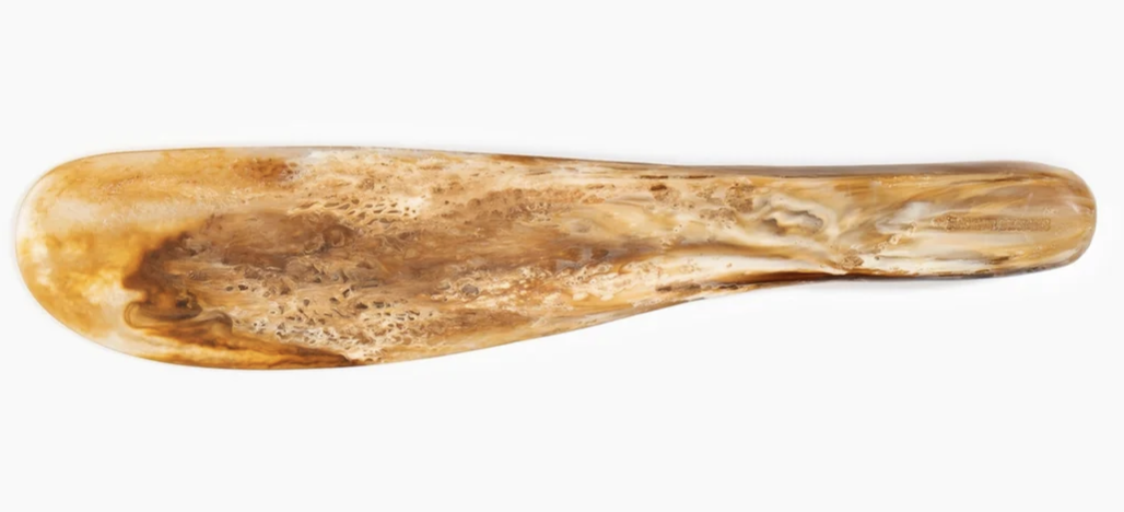Dinosaur Designs Temple cake knife in light horn, caramel marbled resin