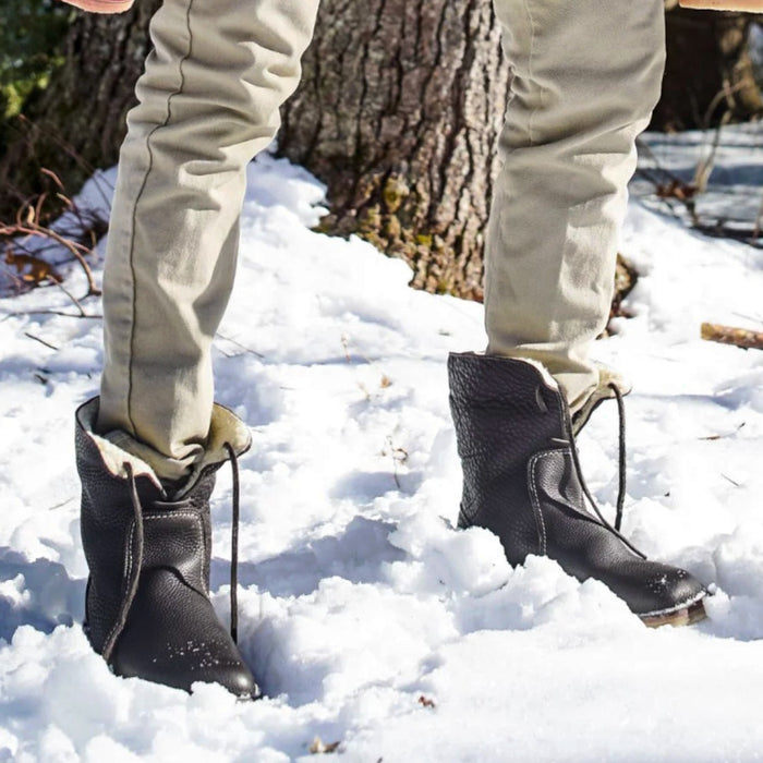 Duckfeet Arhus shearling lined leather boots worn in snow with the cuff folded up