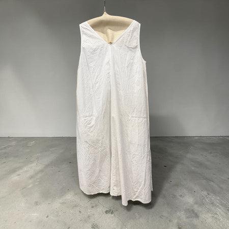 Ewa i Walla Aili white cotton pinafore dress on a hanger