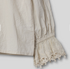 Ewa i Walla Dalia blouse, close-up of gathered sleeve and lace cuff