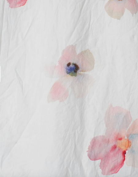 Ewa i Walla Davida dress, close-up of a pink flower on white crinkle cotton