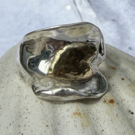 Designs by Flick 10ct gold heart ring on a broad wave of silver by Flick Pope