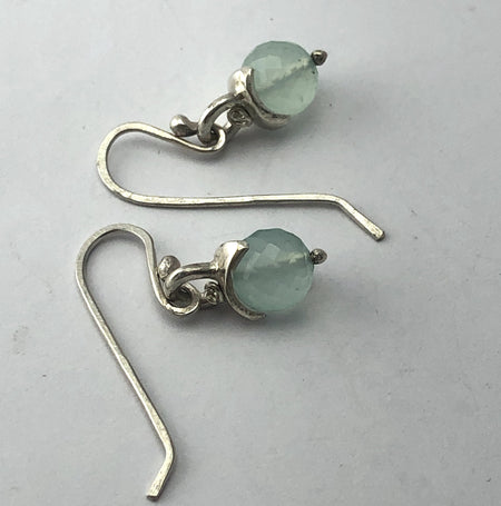 Flick Pope chalcedony and silver hook earrings, laid flat