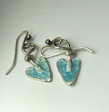 Flick Pope aqua enamel heart hook earrings, laid flat