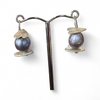Flick Pope Oke Doke silver grey pearl earrings on a stand