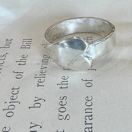 Flick Pope silver heart on side ring, side view