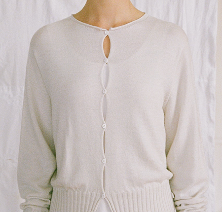 Francie Anni lightweight cardigan in ivory, close-up of the shell button front
