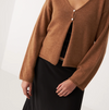 Francie Bella merino cardigan in brown sugar, close-up of the two-button V-neck