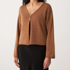 Francie Bella merino cardigan in brown sugar, a V-neck knit worn with a black skirt