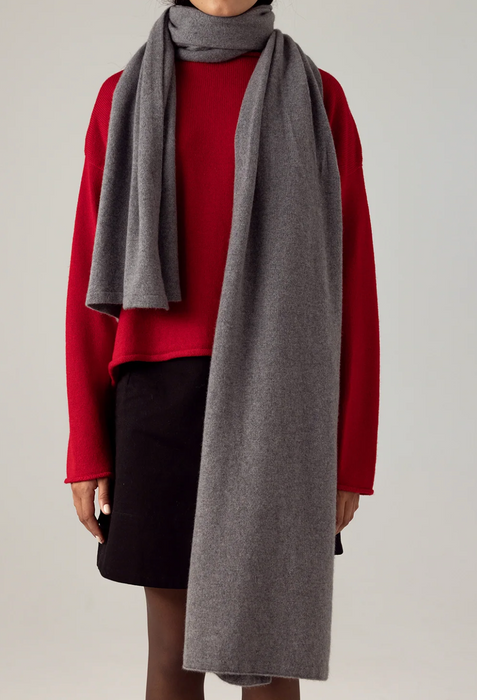 Francie Cloud possum merino scarf in granite grey, worn long over a red jumper