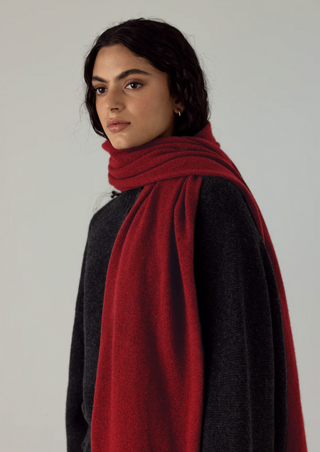 Francie Cloud possum merino scarf in poppy red, draped over the shoulders