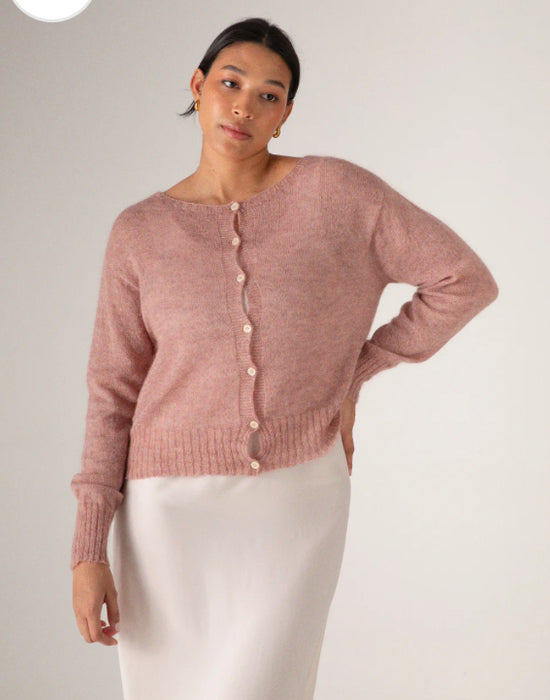 Francie Fleur mohair cardigan in dusk pink, buttoned with a white slip skirt