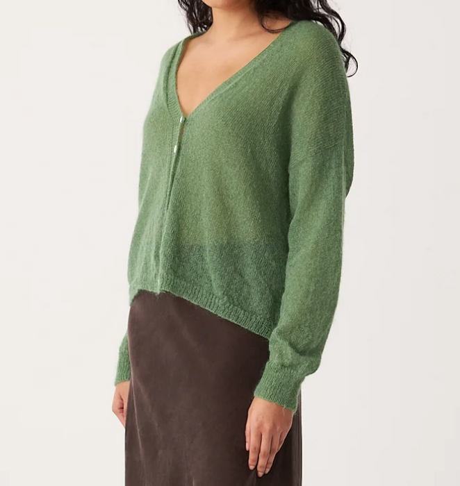 Francie Fleur mohair cardigan in green, side view with a brown skirt
