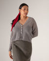 Francie Fleur mohair cardigan in grey, worn with a red hair scarf and olive skirt