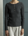 Francie Form ribbed merino henley top in shadow grey, worn with cream trousers