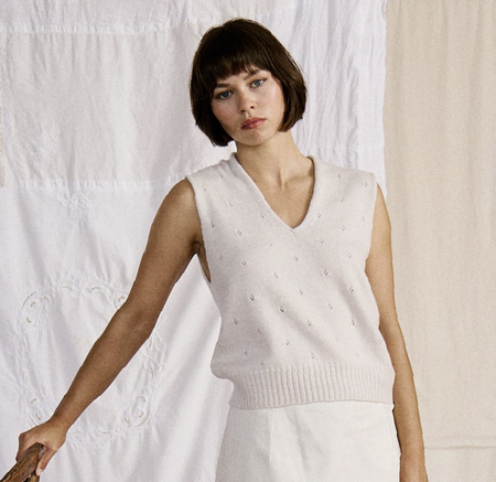 Francie Glimmer merino lace vest in ivory, a V-neck eyelet knit, front view