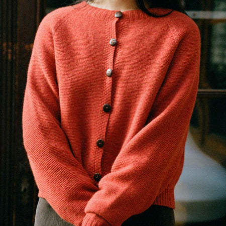 Francie Loft merino cardigan in amber rust, a crew neck button-front knit cardigan with raglan sleeves