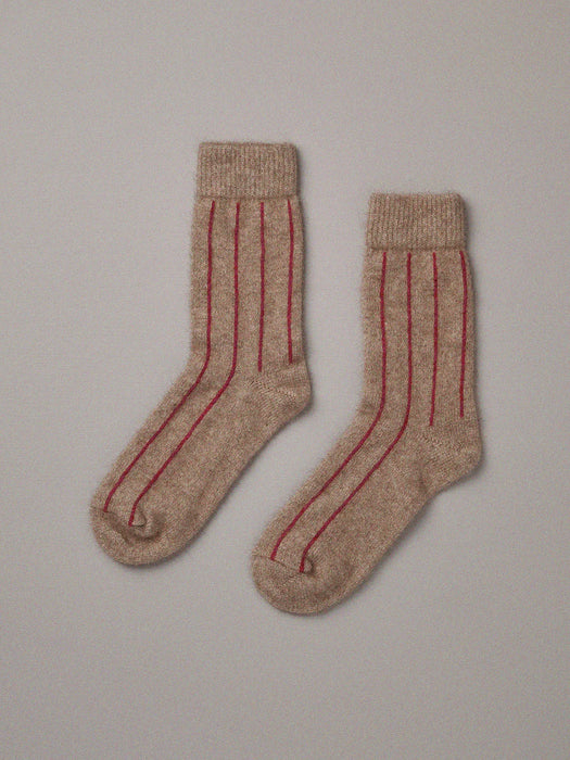 Francie possum merino socks in natural with crimson vertical stripes