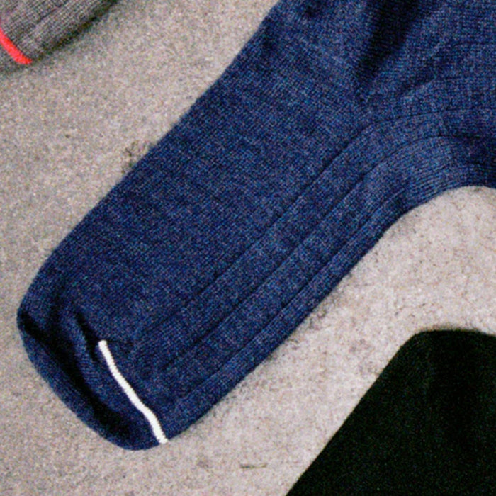 Francie Tip toe crew socks laid flat, ribbed knit sock in blue with contrast toe stripe