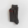 Francie tip toe crew socks in grey, folded flat showing ribbed knit and red contrast toe stripe