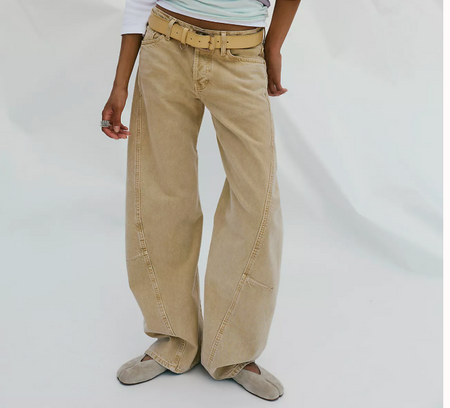 Free People Fable twisted seam bow leg jeans in oat latte, worn front view