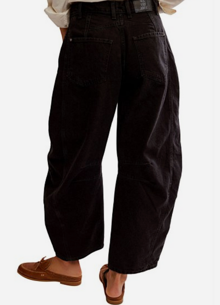 Free People Good Luck barrel jeans in black denim, back view with loafers