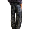 Free People Good Luck barrel jeans in navy paisley, worn with striped top