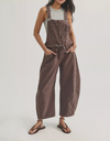 Free People Good Luck barrel overalls in chocolate brown denim, worn front view