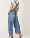 Free People Good Luck barrel overalls in light blue denim, back view