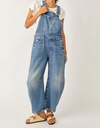 Free People Good Luck barrel overalls in light blue denim, worn front view