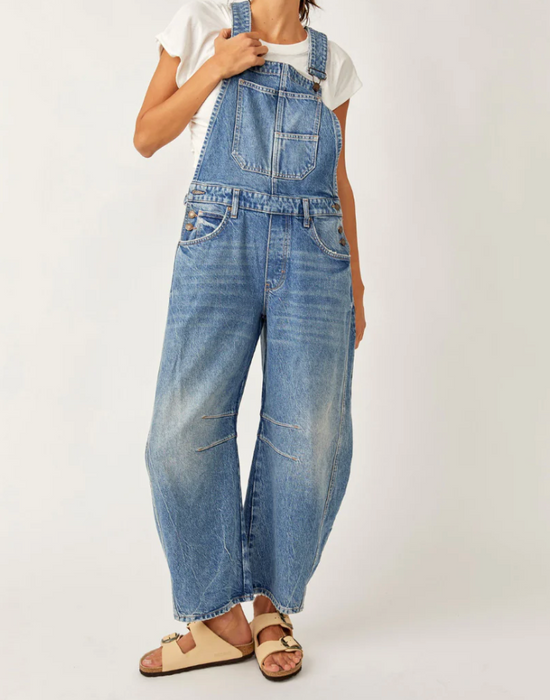 Free People Good Luck barrel overalls in light blue denim, worn front view