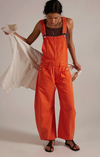 Free People Good Luck barrel overalls in spicy orange denim, worn front view