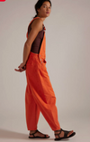 Free People Good Luck barrel overalls in spicy orange denim, side view