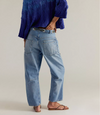 Free People Moxie low slung jeans in faded blue denim, side view