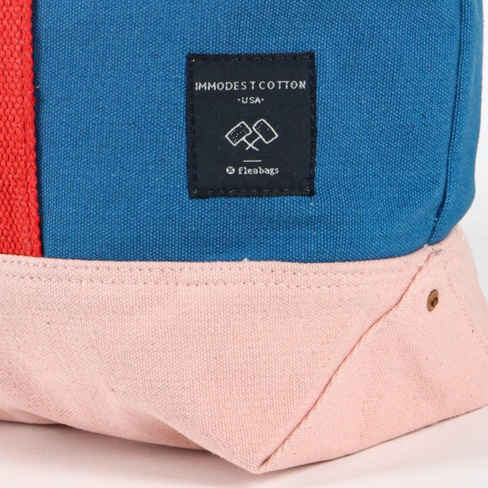 Immodest Cotton canvas lunch bag, detail of the pink reinforced base and woven label