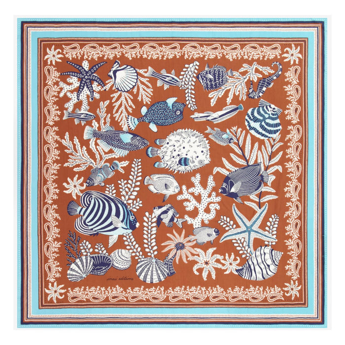 Inouitoosh Neptune cotton and silk square scarf in golden brown, sea life print with fish and shells, laid flat