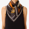 Close up of model wearing the Inouitoosh Tequila lemon square scarf 