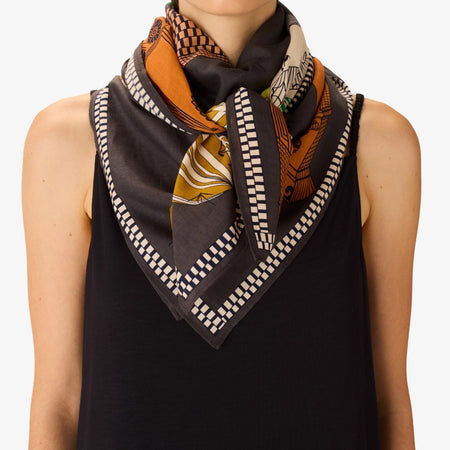 Close up of model wearing the Inouitoosh Tequila lemon square scarf 