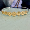 Kate Macindoe brass daisy bangle