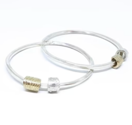 Kate Macindoe sea bangle in silver and brass