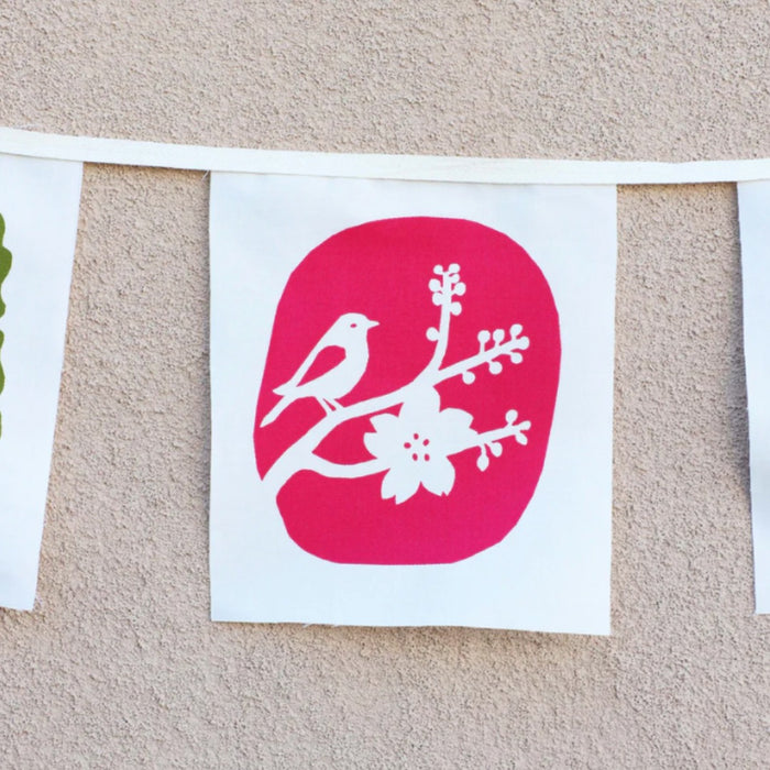 Kei and Molly garden delights bunting, detail of a pink bird and blossom flag
