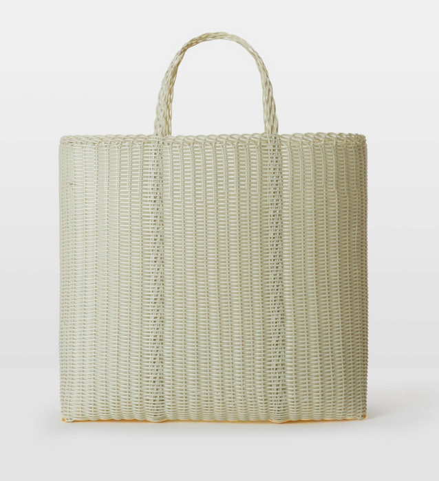 Woven tote bag on a white background