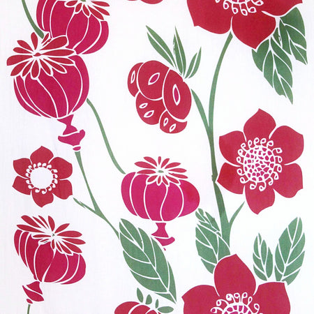 Detail of the Les Belles Vagabondes pink poppy print, red poppies and green leaves on white cotton