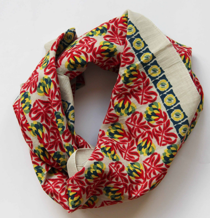 Les Belles Vagabondes Heidi cotton square scarf, red floral print with yellow trim, coiled